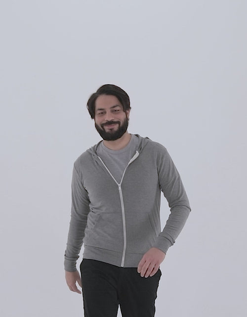 Load and play video in Gallery viewer, Bella Canvas 3939 Unisex Triblend Zip Hoodie.mp4
